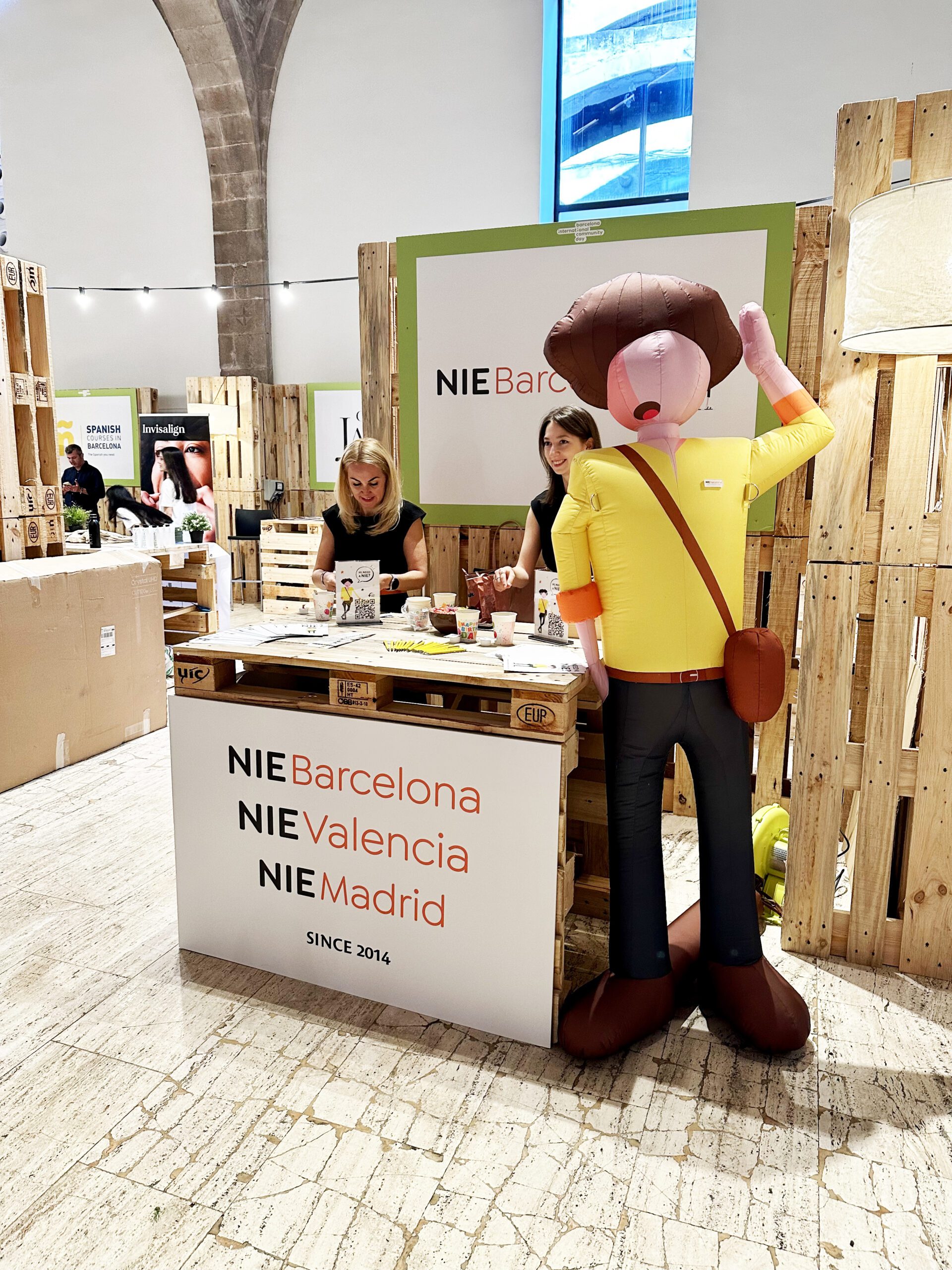 NIE Barcelona exhibition booth design and print materials